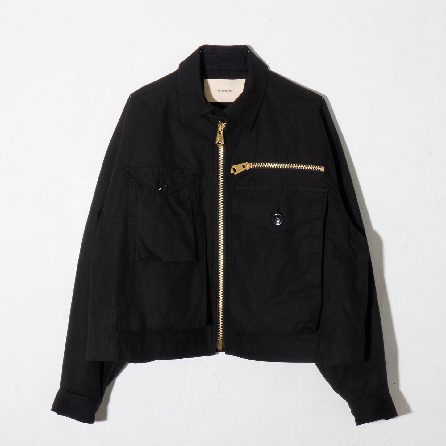 written by /MULTI POCKET ZIP UP BLOUSON. / bk