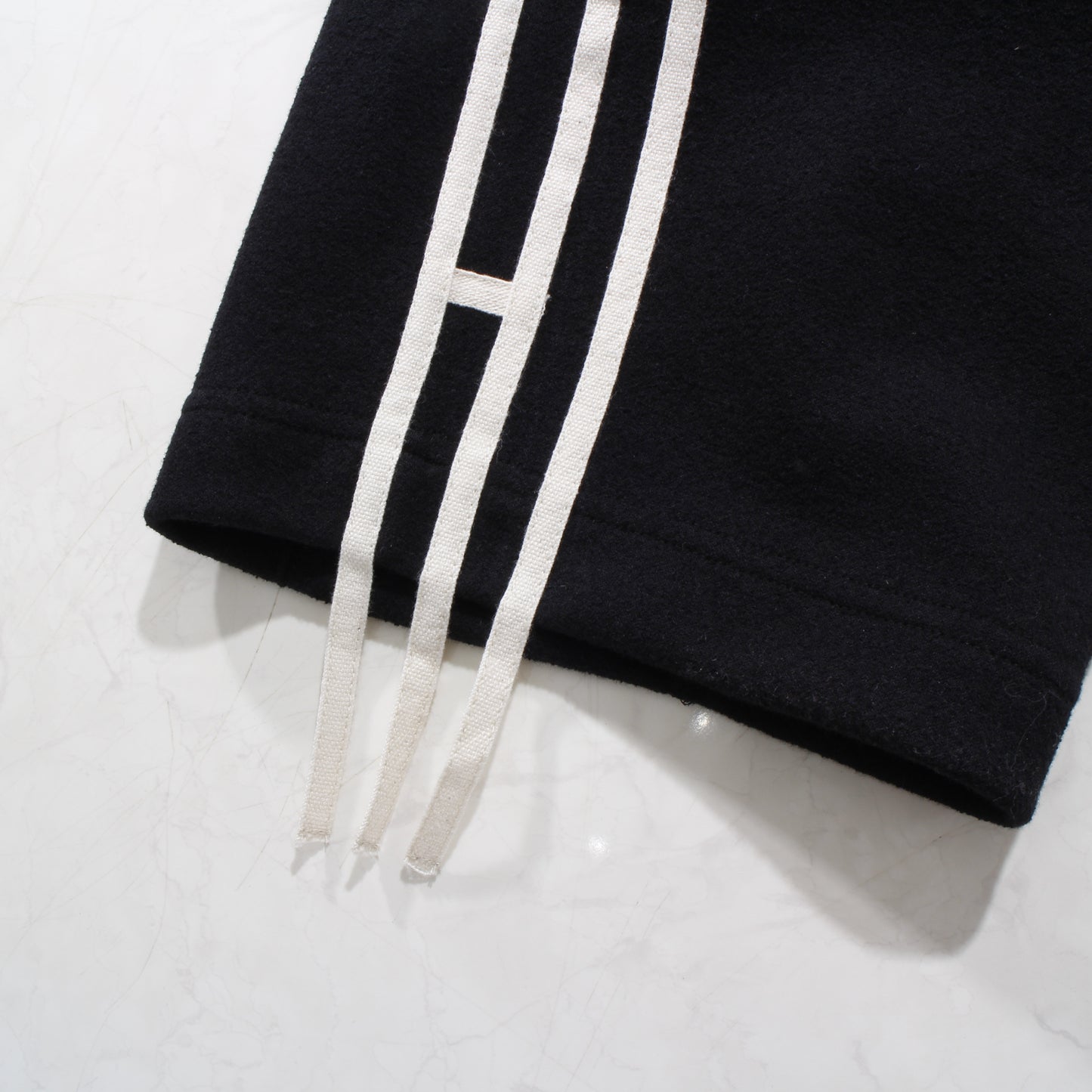 "amida" line track pants / black