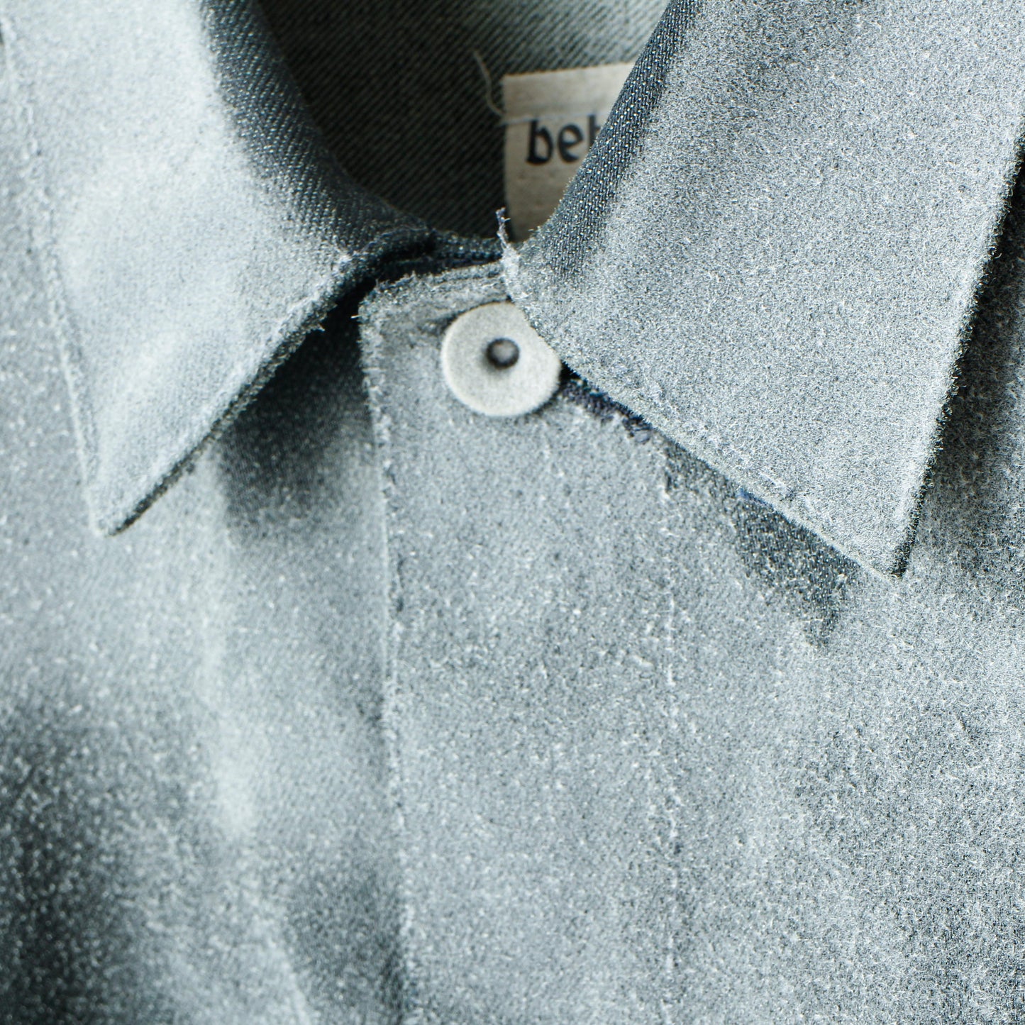 dusted aging denim jacket