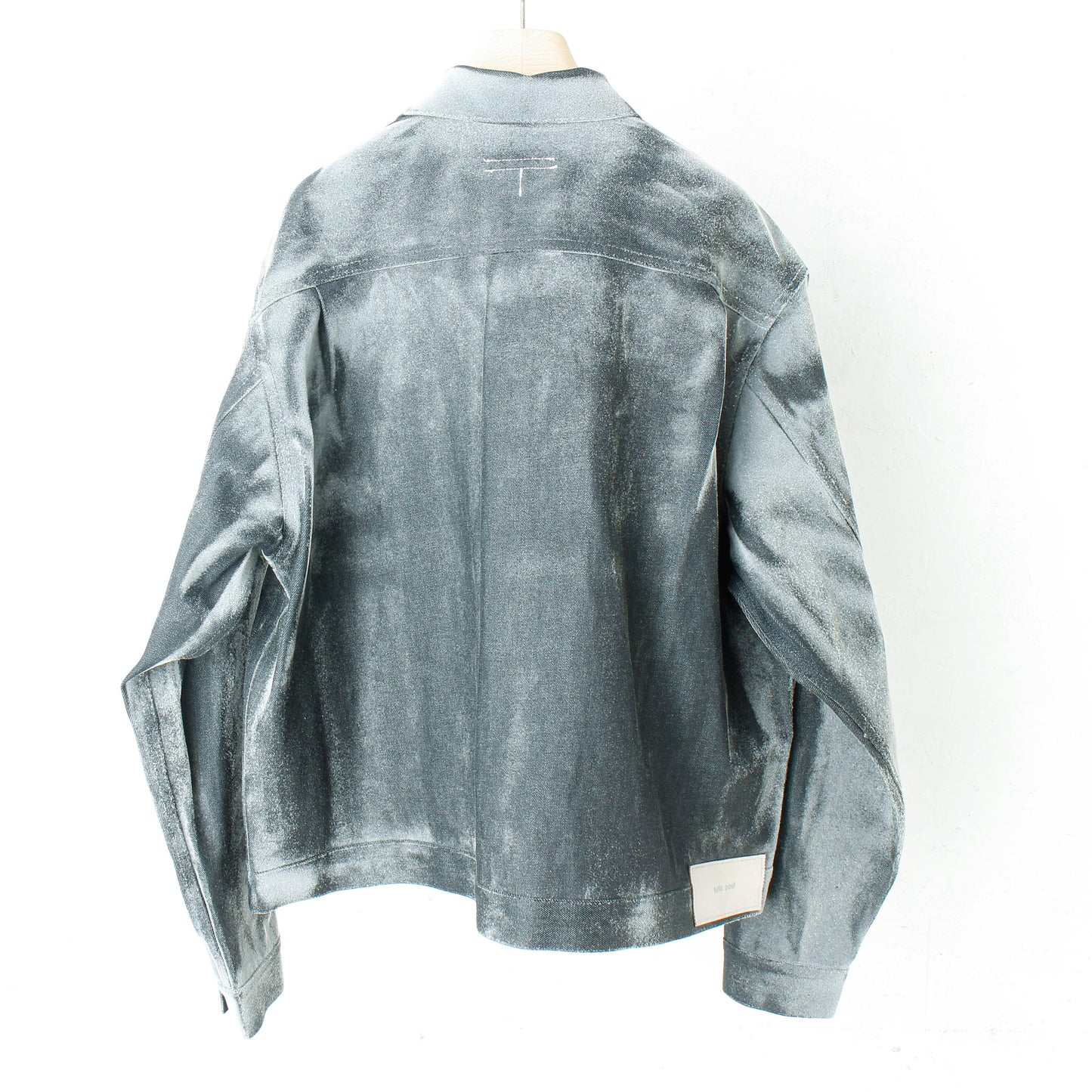 dusted aging denim jacket