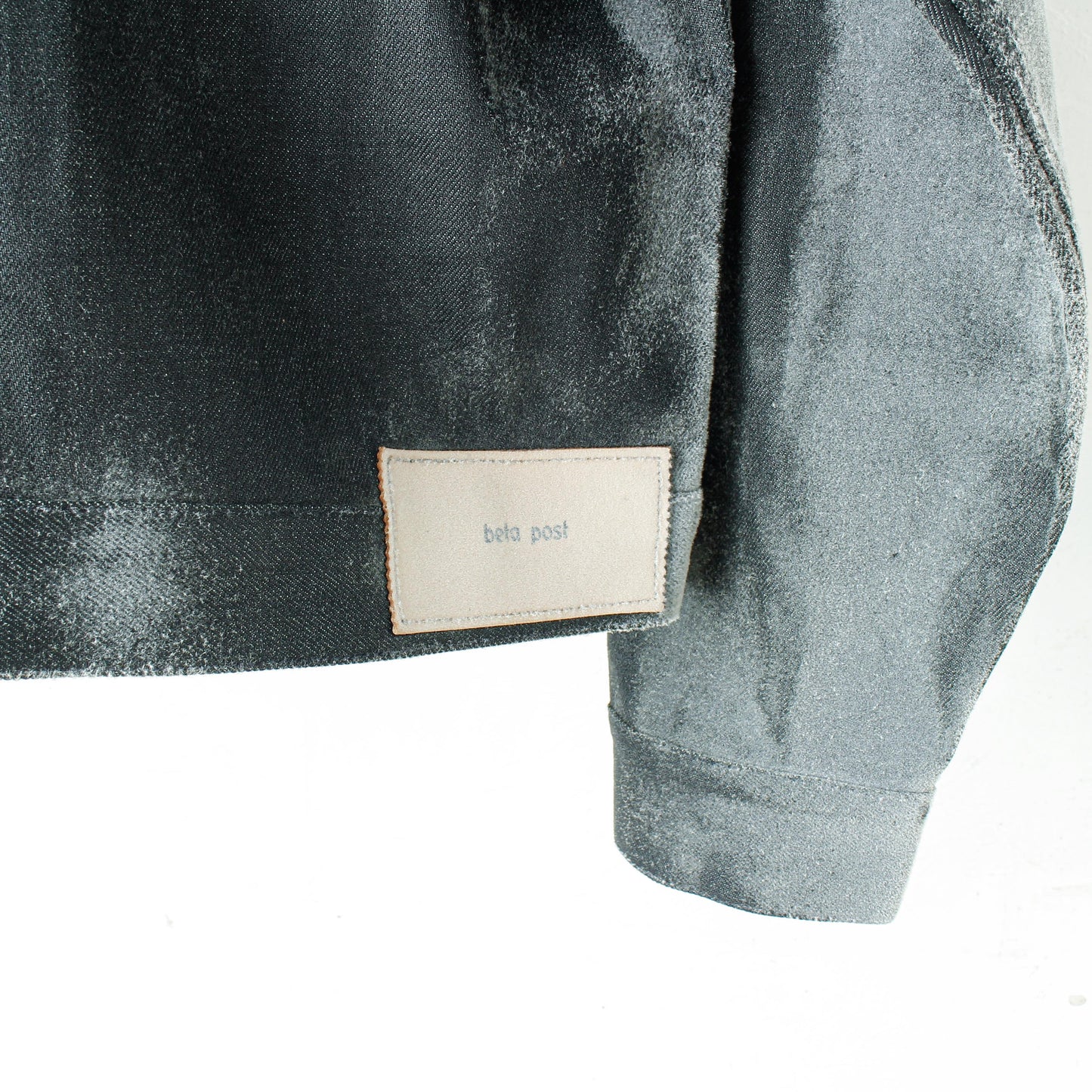 dusted aging denim jacket