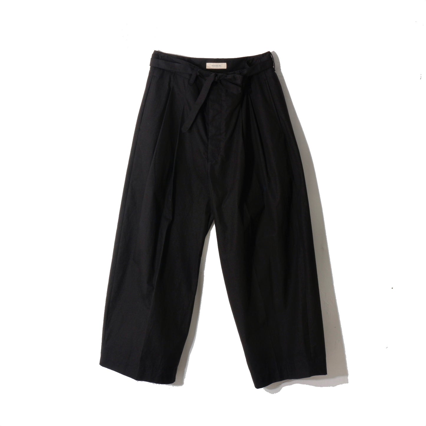 written by / slacks pants /bk