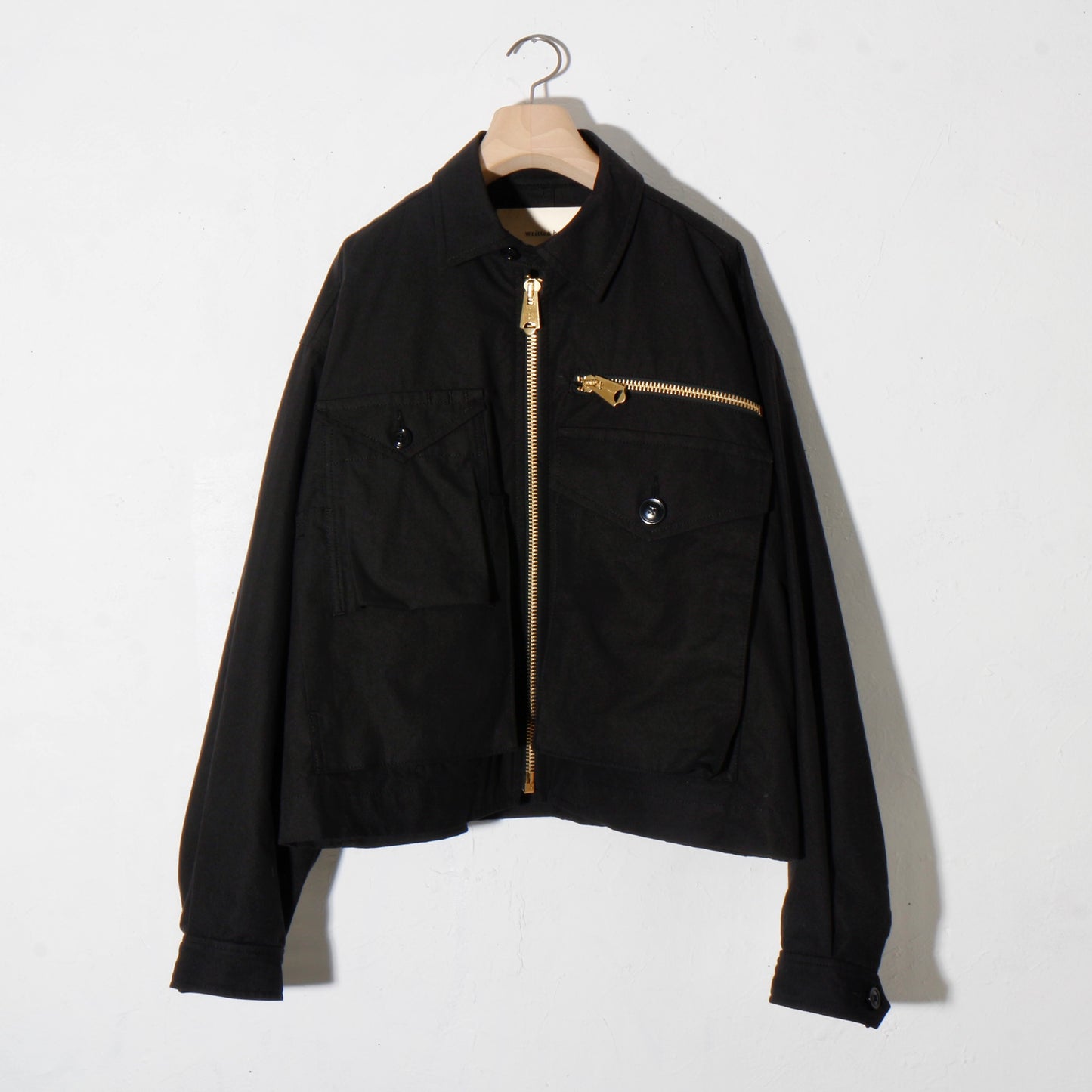 written by /MULTI POCKET ZIP UP BLOUSON. / bk