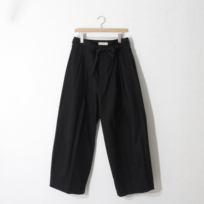 written by / slacks pants /bk