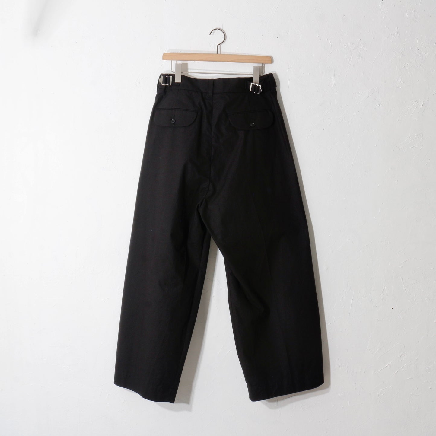 written by / slacks pants /bk