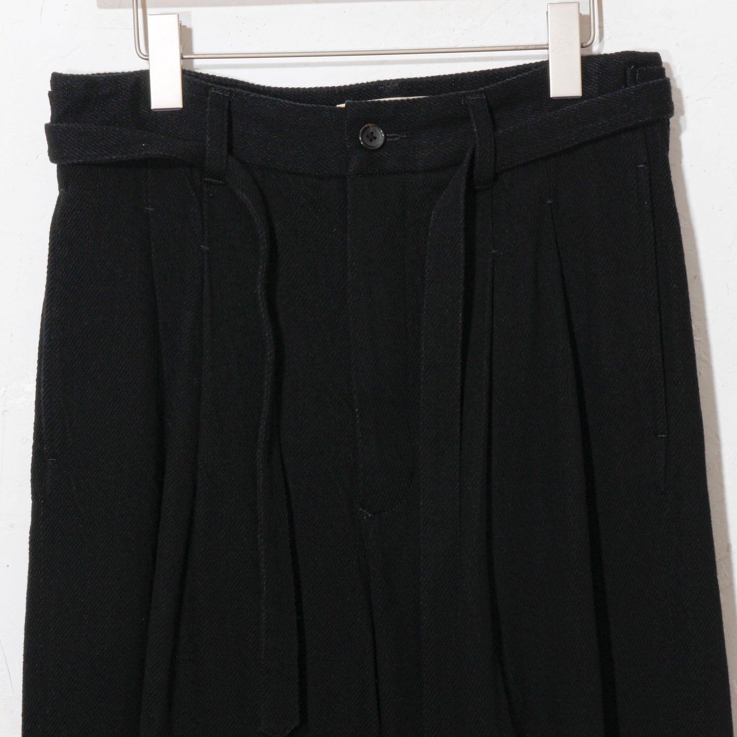 written by /thick twill slacks pants / black